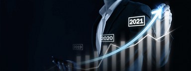 Businessman points to an illustration of the market growth graph over several years leading to 2021