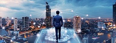 a man walking on a virtual network ground looking at a network grid over a cityscape