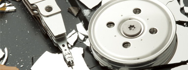 A broken hard drive platter.