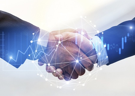 2 bàn tay ở tư thế bắt tay, với mạng lưới toàn cầu và minh họa đồ thị